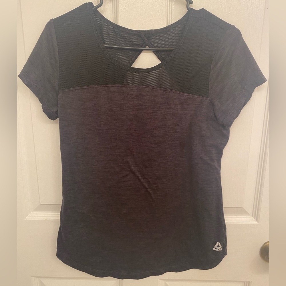 Black athletic top by Reebok